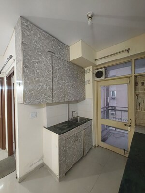 Kitchen in 1 BHK Apartment at Adani Aangan, Sector 89a – for Rent