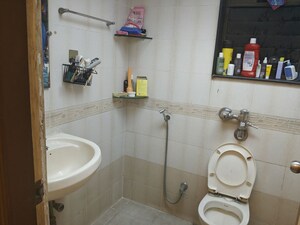 Bathroom in 3 BHK Apartment at Sterling Court, Andheri East – for Rent