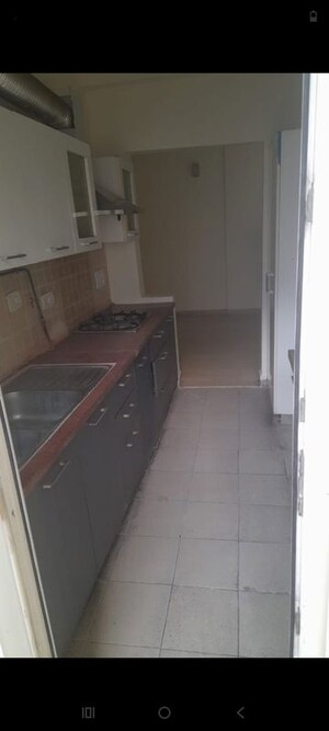 Kitchen in 3 BHK Apartment at Mahagun Moderne, Sector 78 – for Rent