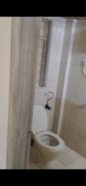 Bathroom in 2 BHK Apartment at Bhoomi Classic, Malad West – for Rent
