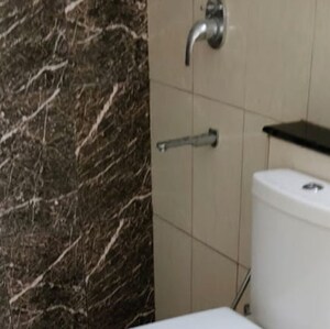 Bathroom in 2.5 BHK Apartment at Mantri Webcity, Hennur Road – for Rent
