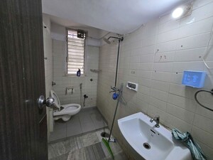 Bathroom in 2 BHK Apartment at Raj Kiran CHS, Andheri West – for Rent