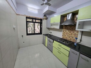 Kitchen in 2 BHK Apartment at Raj Kiran CHS, Andheri West – for Rent