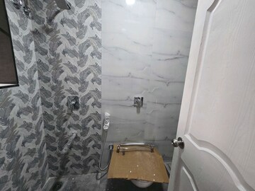 Bathroom in 2 BHK Apartment at Parijat CHS Andheri West, Yari Road – for Rent