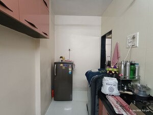 Kitchen in 1 BHK Apartment at Sumangal CHS Airoli, Kopar Khairane – for Rent