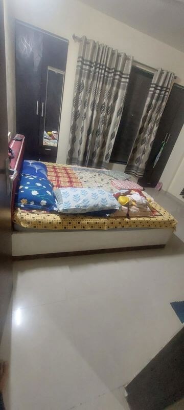 Bedroom in 2 BHK Apartment at Dreams Nandini, Shewalwadi – for Rent