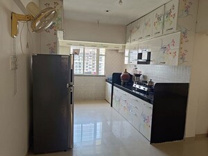 Kitchen in 2 BHK Apartment at Sancheti Eves Garden, Mundhwa – for Rent
