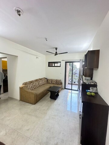 Living Room in 1.5 BHK Apartment at Lodha Palava City Lakeshore Greens, Dombivli East – for Rent