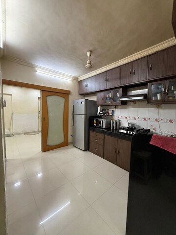 Kitchen in 2 BHK Apartment at New Jay Palace, Yari Road – for Rent