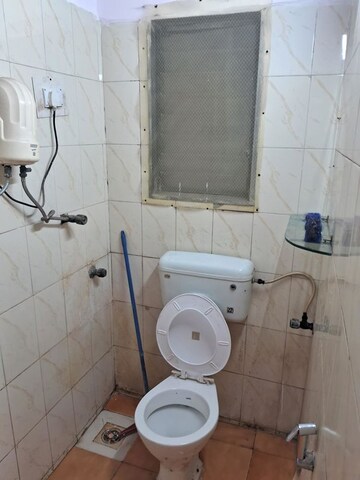 Bathroom in 2 BHK Apartment at New Jay Palace, Yari Road – for Rent