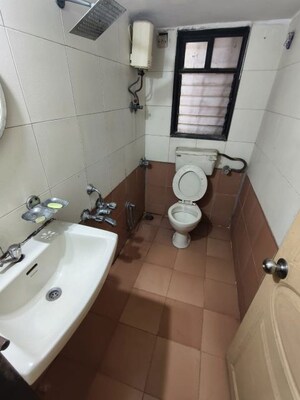 Bathroom in 2 BHK Apartment at Sadguru Complex I, Goregaon East – for Rent