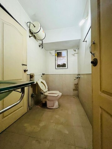 Bathroom in 2 BHK Apartment at Venkatesh Flora Phase II, Mundhwa – for Rent
