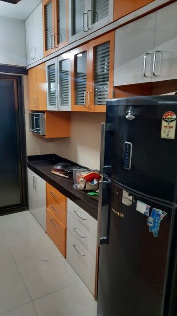 Kitchen in 2 BHK Apartment at Tharwani Heritage, Kharghar Sector 7 – for Rent