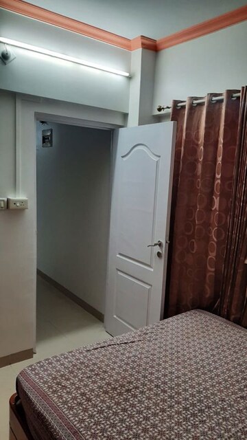 Bedroom in 2 BHK Apartment at Tharwani Heritage, Kharghar Sector 7 – for Rent
