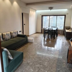 Living Room in 2 BHK Apartment at Golden Chariot CHS, Shashtri Nagar – for Rent
