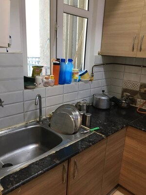 Kitchen in 2 BHK Apartment at Aims Golf Avenue II, Sector 75 – for Rent