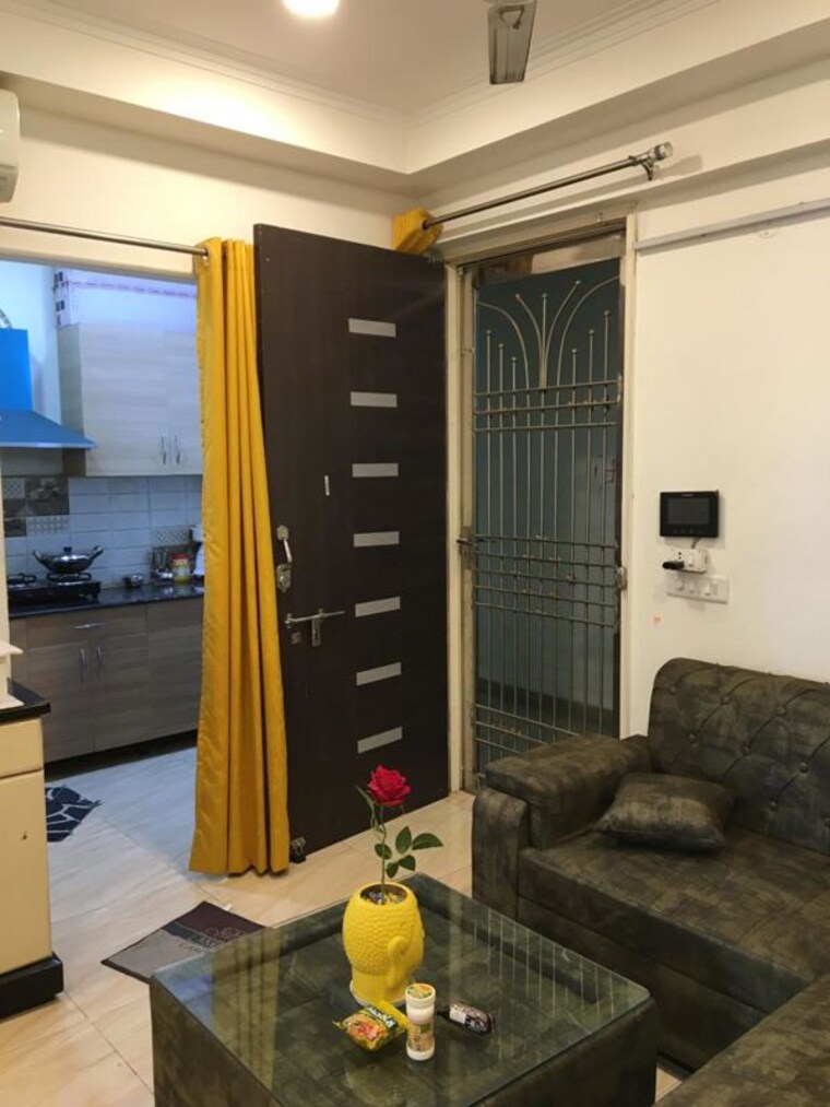 Living Room, aims-golf-avenue-ii 2 Bedroom 930 Sq.Ft. Apartment In Sector 75 Noida 9765318