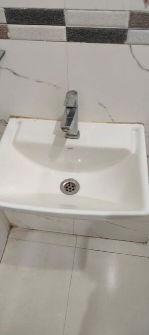 Bathroom in 1 BHK Apartment at Dynamic Crest, Shilphata – for Rent