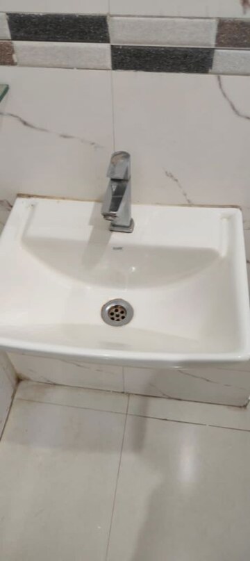 Bathroom in 1 BHK Apartment at Dynamic Crest, Shilphata – for Rent