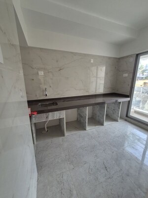 Kitchen in 3 BHK Apartment at Pafilia Sunita Heights, Naupada – for Sale