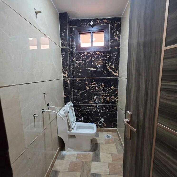 Bathroom, dwarka mor 2 Bedroom 60 Sq.Yd. Builder Floor In Dwarka Mor Delhi 9765403
