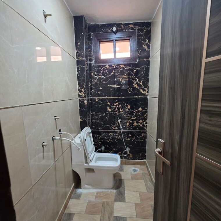 Bathroom, dwarka mor 2 Bedroom 60 Sq.Yd. Builder Floor In Dwarka Mor Delhi 9765403