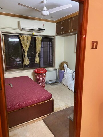 Bedroom in 3 BHK Apartment at Brindavan CHS, Andheri East – for Rent