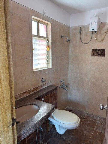 Bathroom in 2 BHK Apartment at Rhythm Society, Wakad – for Rent