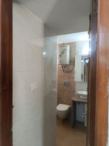 Bathroom in 3 BHK Apartment at Vasant Kunj – for Rent