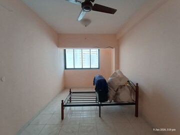 Living Room in 2 BHK Apartment at Kopar Khairane Sector 19 – for Sale