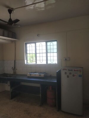 Kitchen in 2 BHK Apartment at Kumar Padmalaya, Aundh – for Rent
