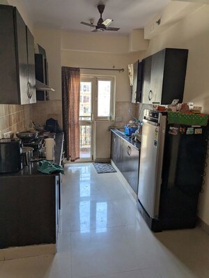 Kitchen in 2 BHK Apartment at Aims Golf City, Sector 75 – for Rent