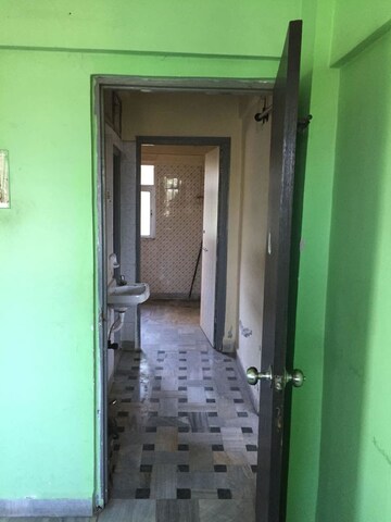 Room in 1 BHK Apartment at Link Palace, Malad West – for Sale