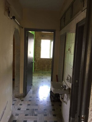 Room in 1 BHK Apartment at Link Palace, Malad West – for Sale