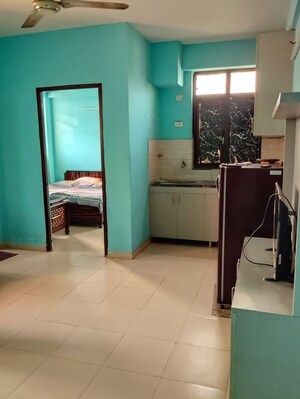 Living Room in 1.5 BHK Apartment at Auric City Homes, Sector 82 – for Rent