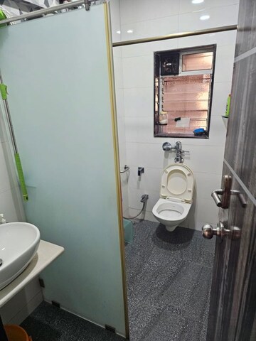 Bathroom in 3 BHK Apartment at Om Viraj Apartment, Andheri West – for Rent