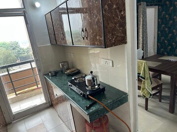 Kitchen in 2 BHK Apartment at Ansal Paradise Crystal, Sushant Golf City – for Rent