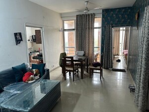 Living Room in 2 BHK Apartment at Ansal Paradise Crystal, Sushant Golf City – for Rent