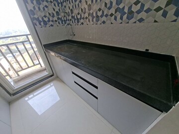 Kitchen in 1 BHK Apartment at Raunak Bliss B2, Ghodbunder Road – for Rent