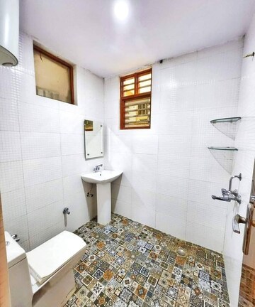 Bathroom in 1 BHK Apartment at Freedom Fighters Enclave – for Rent
