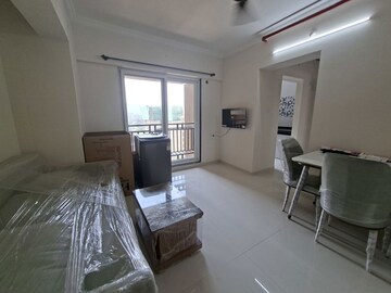 Living Room in 1 BHK Apartment at Raunak Bliss B2, Ghodbunder Road – for Rent