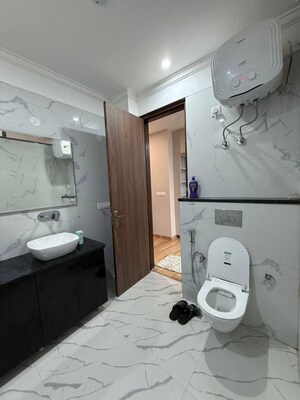 Bathroom in 2 BHK Apartment at Freedom Fighters Enclave – for Rent