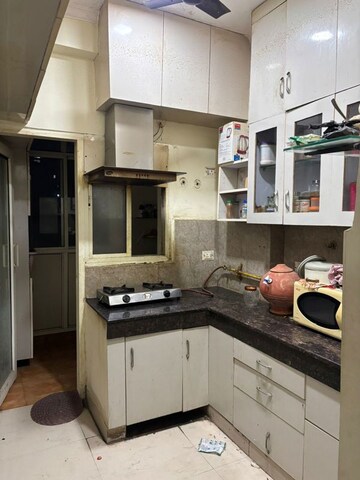 Kitchen in 2 BHK Apartment at Antriksh Golf View, Sector 78 – for Rent