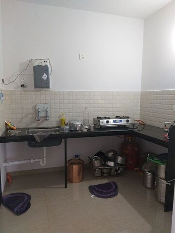 Kitchen in 2 BHK Builder Floor at Kolte Patil Three Jewels, Kondhwa – for Rent