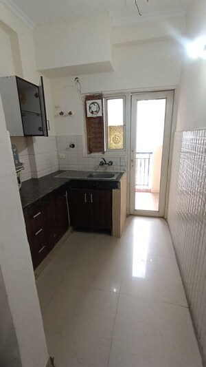 Kitchen in 2 BHK Apartment at Antriksh Golf View, Sector 78 – for Rent