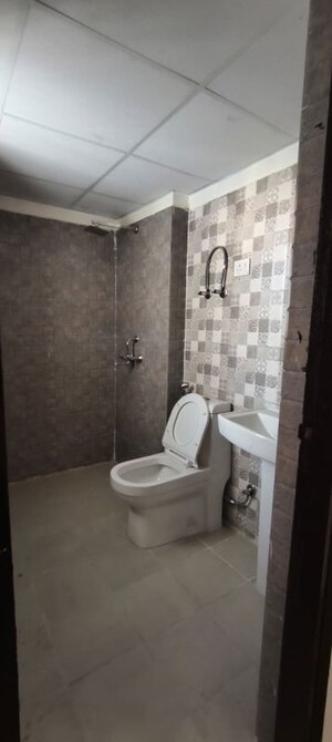 Bathroom in 2 BHK Apartment at Gardenia Golf City, Sector 75 – for Rent