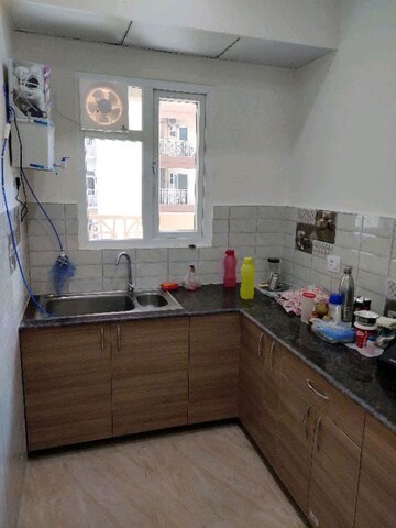 Kitchen in 2 BHK Apartment at Gaur 14th Avenue High Street, Sector 16c Greater Noida – for Sale