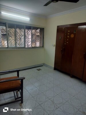 Bedroom in 1 BHK Apartment at Asmita Jyoti CHS, Malad West – for Rent