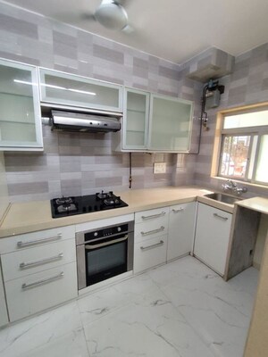 Kitchen in 1 BHK Apartment at Om Sadguru CHS, Ic Colony – for Rent