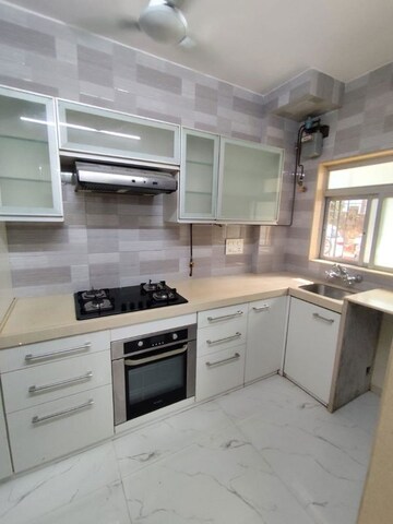 Kitchen in 1 BHK Apartment at Om Sadguru CHS, Ic Colony – for Rent